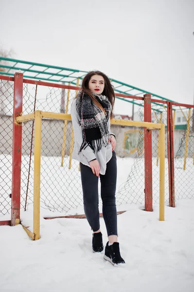 Brunette casual girl in scarf at winter on street. — Stock Photo, Image