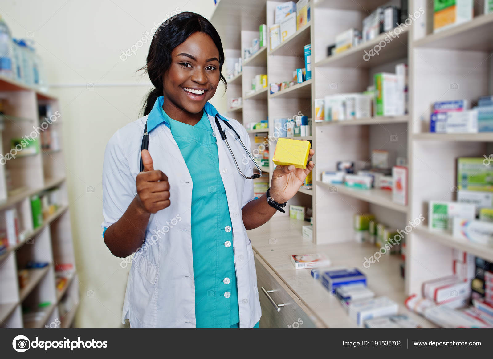 African american pharmacist working in drugstore at hospital pha Stock