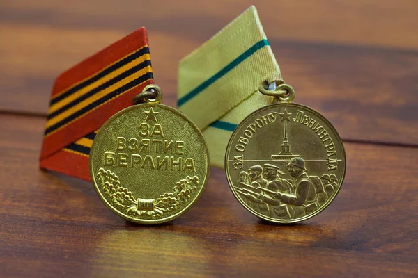 Rare soviet military awards on vintage background. Medal for capture of berlin and Leningrad defence. — 图库照片