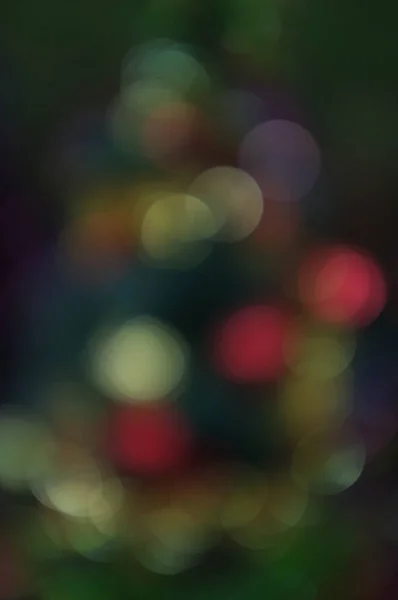 Blur celebración de la luz en el árbol de Navidad con fondo bokeh —  Fotos de Stock