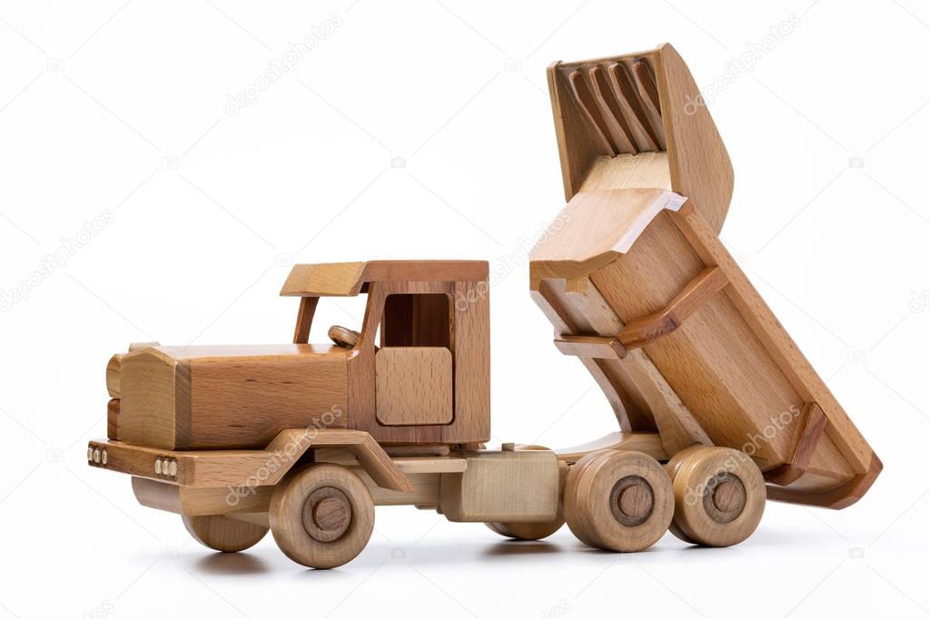 Wooden car close-up isolated on white background.
