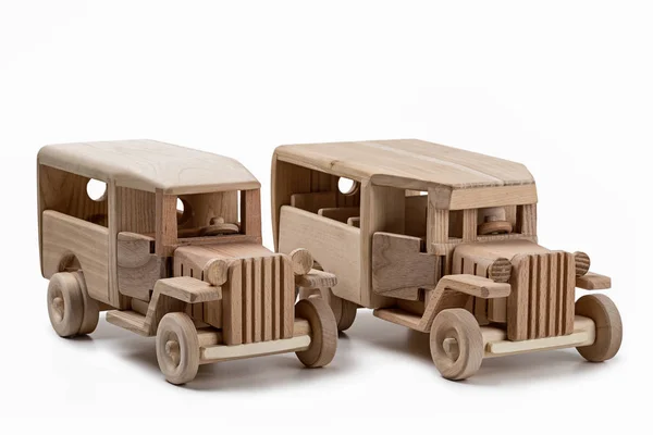 스튜디오에서 두 나무 빈티지 버스 장난감. — 스톡 사진