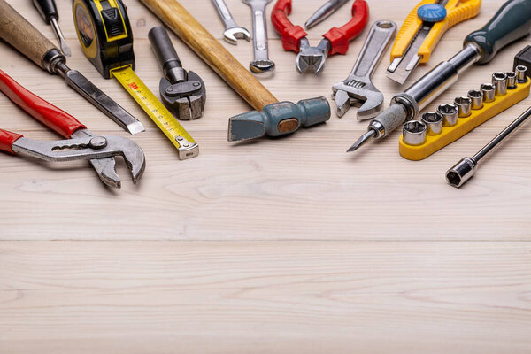 Home set of carpentry tools for repair, DIY. Tools for every day. Father's Day and other men's holidays. Close-up, studio shot, copy space.