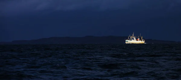 Bright Cargo Ship Very Dark Sea — Stock Photo, Image