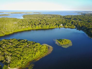 Aerial of Freshwater Lake During Summertime on Cape Cod clipart