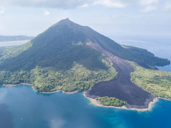 An old lava flow is seen on Banda Api in the Banda Islands of Indonesia. This tropical region, part of the Ring of Fire, is known for its extraordinary marine biodiversity.