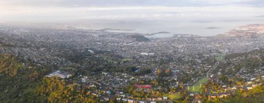 Early morning light shines on the East Bay and San Francisco Bay in Northern California. This region of the west coast is densely populated but is not far from Lake Tahoe and Yosemite National Park. clipart