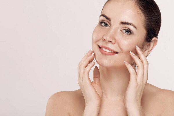 Beautiful woman with nature makeup. Beauty portrait of female face with natural skin. Skin care. Cosmetology, beauty and spa.