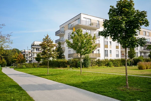 stock image New apartment building - modern residential development in a green urban settlement