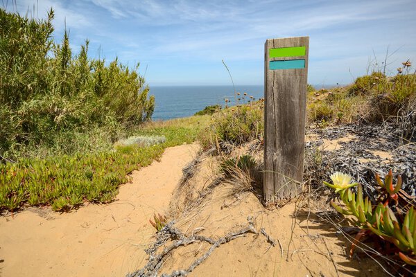Hiking trail Rota Vicentina from Odeceixe to Zambujeira do Mar through Alentejo landscape, Portugal