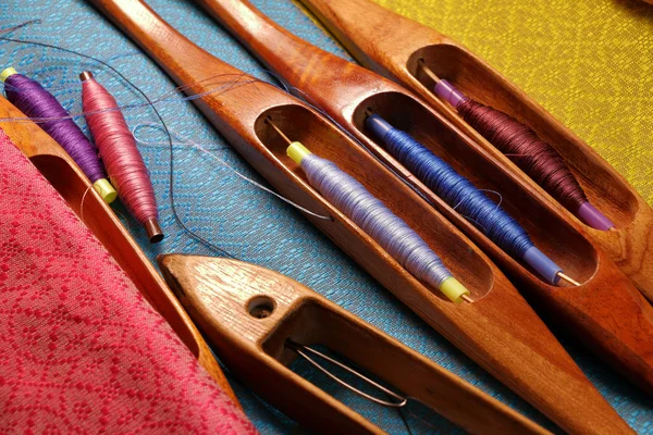 Wooden weaving shuttle for silk textile production — Stock Photo, Image