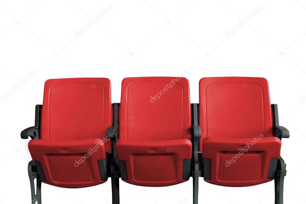 Empty theater auditorium or cinema with three red seats