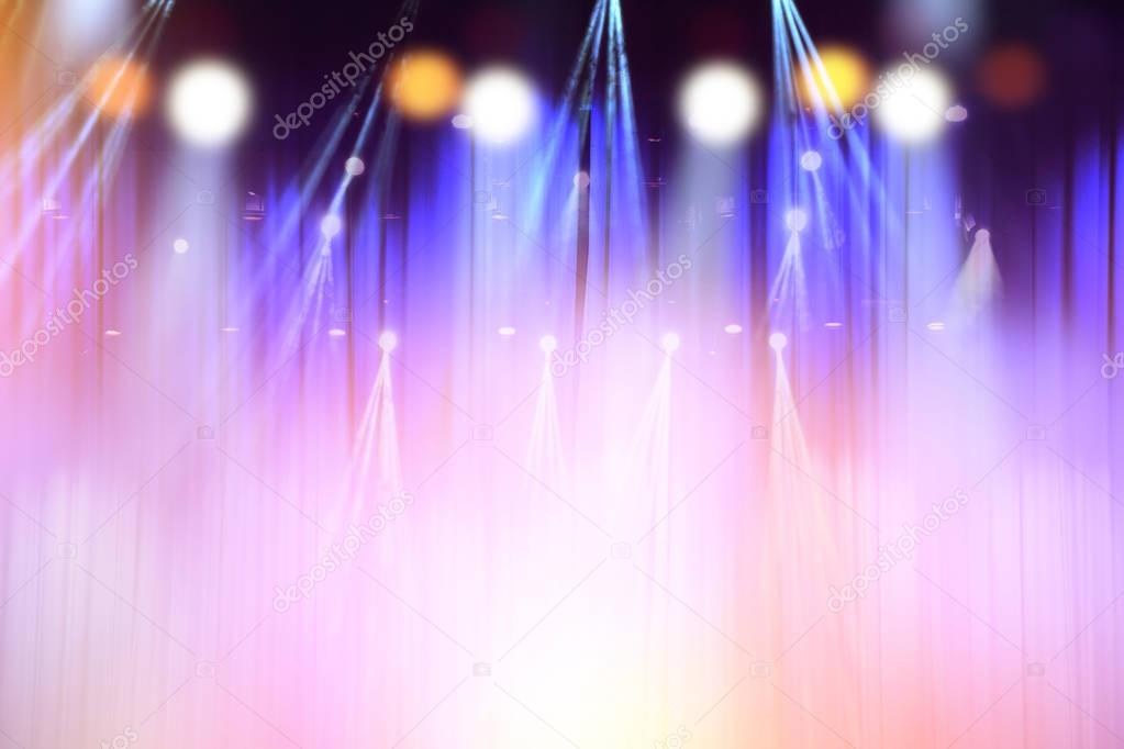blurred lights on stage, abstract image of concert lighting