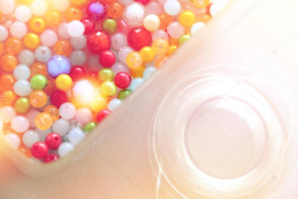 colorful beads in box for handmade accessories, soft tone