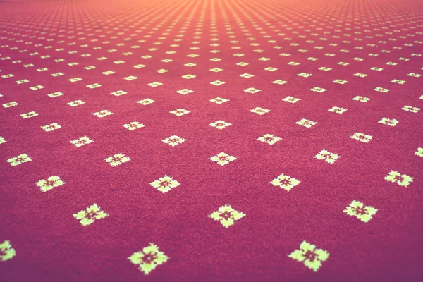 Alfombra roja textura del piso en el cine — Foto de Stock