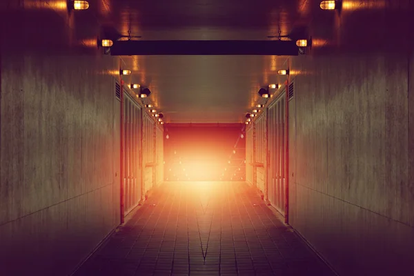 Dark entrance way with little light to tunnel, perspective view — Stock Photo, Image