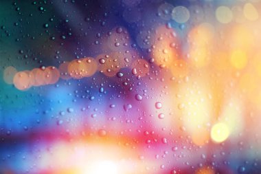 parlak renkli arka plan bulanık su damlaları.