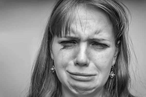 Close up black and white portrait of a crying woman — Stock Photo, Image