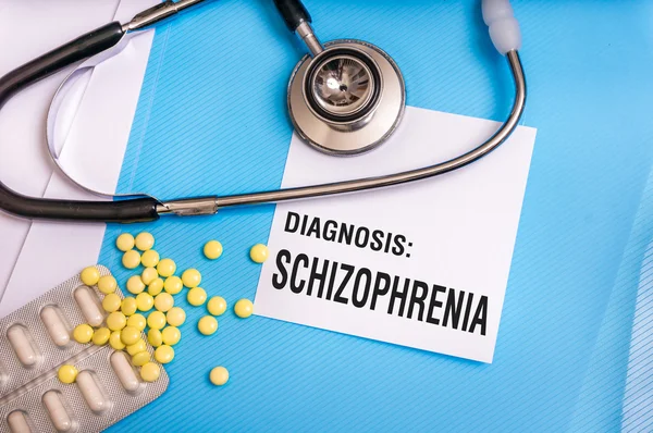 Schizofreni-ord skrivet på medicinska blå mapp — Stockfoto