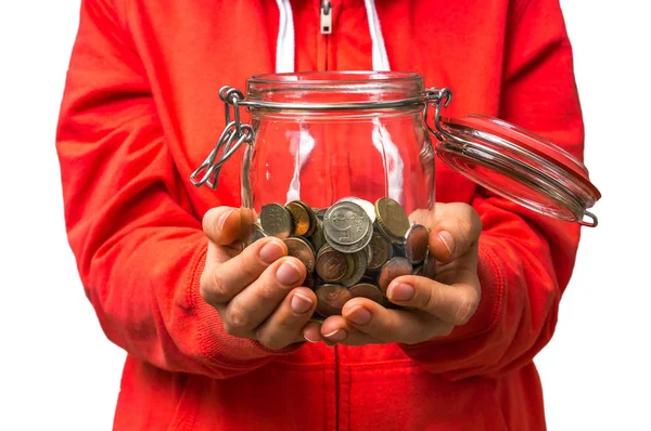 Mulher segurando dinheiro jar com moedas — Fotografia de Stock