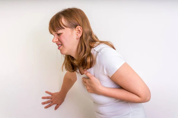 Woman having heart attack — Stock Photo, Image