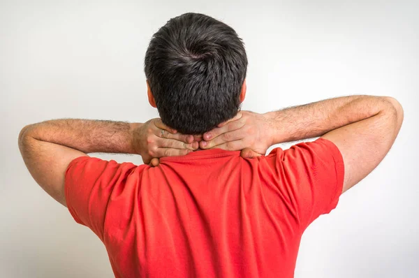 Hombre con dolor en el cuello —  Fotos de Stock