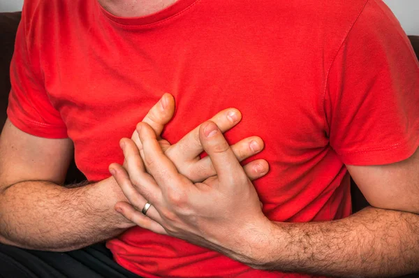 Man having chest pain, heart attack — Stock Photo, Image