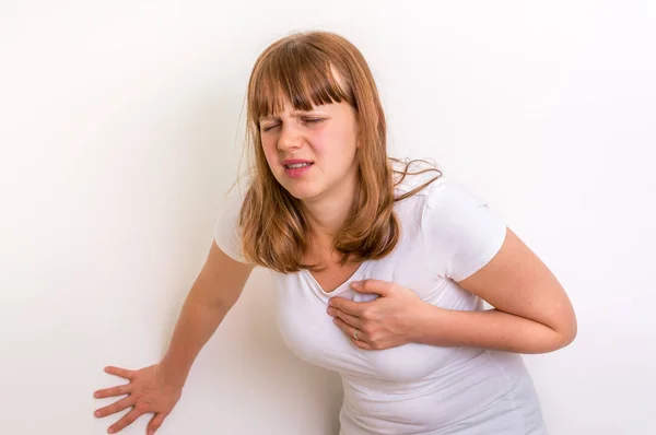 Woman having heart attack — Stock Photo, Image