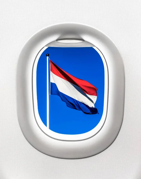 Pohled na vlajka Nizozemska z okna letadla — Stock fotografie