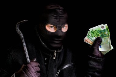 Yün siyah izole çalıntı parayla maskeli hırsız