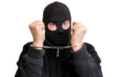 Beyaz izole kelepçeli maskeli hırsız