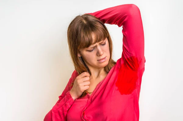 Woman with sweating under armpit — Stock Photo, Image