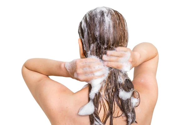 Mujer atractiva lavando el cabello con champú en la ducha — Foto de Stock