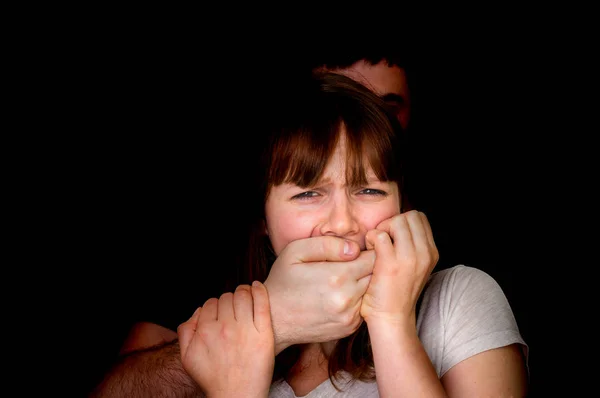 Man covering woman\'s mouth so she couldn\'t scream