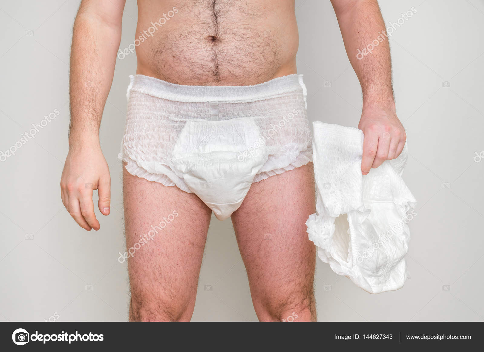 Hombre usando pañal de incontinencia: fotografía de stock © andriano_cz  #144627343