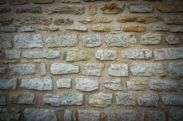 Gray brick wall background with vignetted corners — Stock Photo, Image
