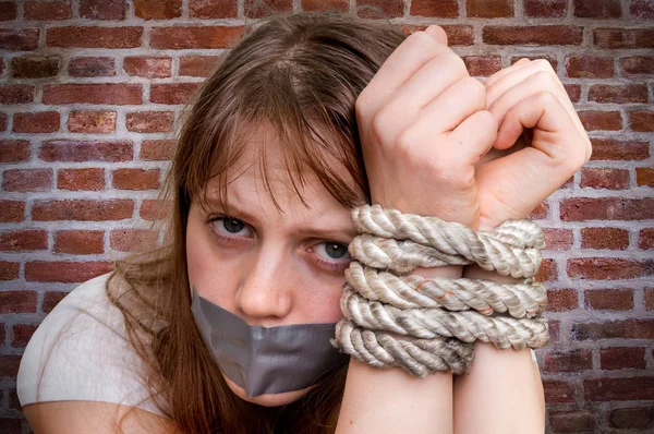 Tied rope hands of kidnapped woman - violence concept — Stock Photo, Image