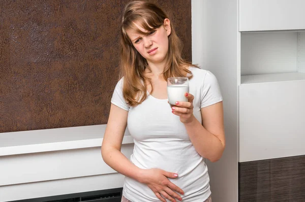 Woman with lactose problem is suffering from stomach pain — Stock Photo, Image