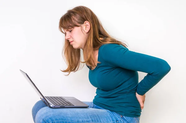 Woman is suffering from back pain - bad posture concept — Stock Photo, Image