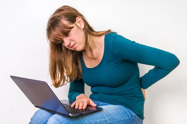 Woman is suffering from back pain - bad posture concept — Stock Photo, Image