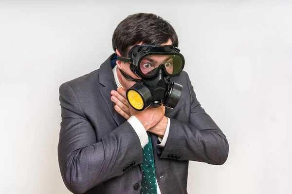 Businessman with gas mask can not breathe bad air — Stock Photo, Image