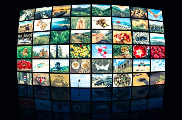 Schermen vormen een grote multimedia uitgezonden video muur — Stockfoto