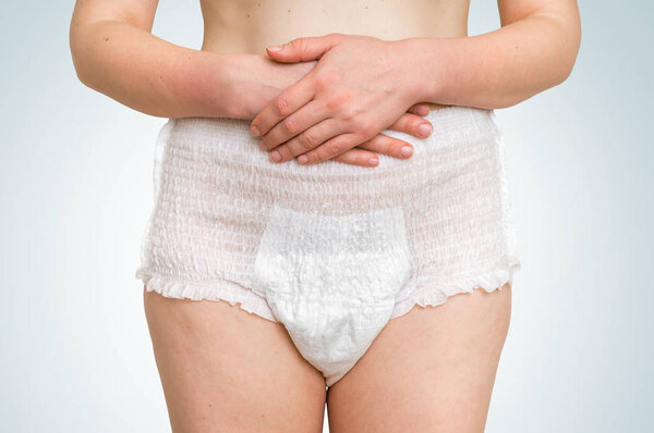 Woman wearing incontinence diaper