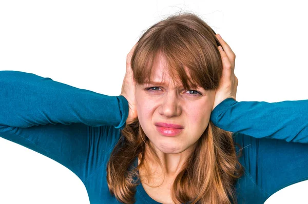 Stressed woman covering her ears to protect from loud noise — Stock Photo, Image
