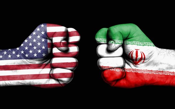 Conflict between USA and Iran - male fists — Stock Photo, Image