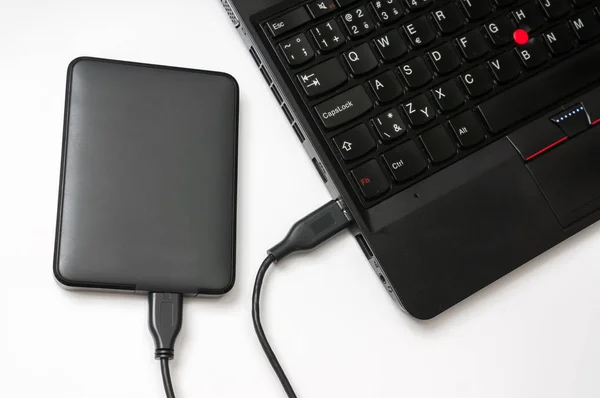 External hard disk (HDD) connected to laptop computer