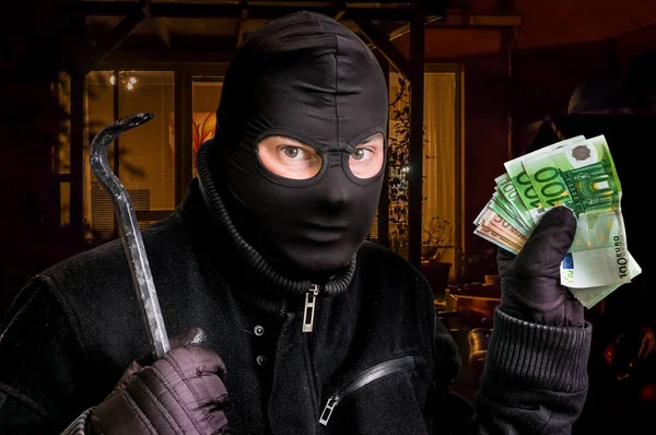 Álarcos tolvaj lopott pénzzel Balaclava — Stock Fotó
