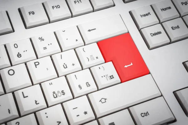 Top view of white keyboard with red Enter button — Stock Photo, Image