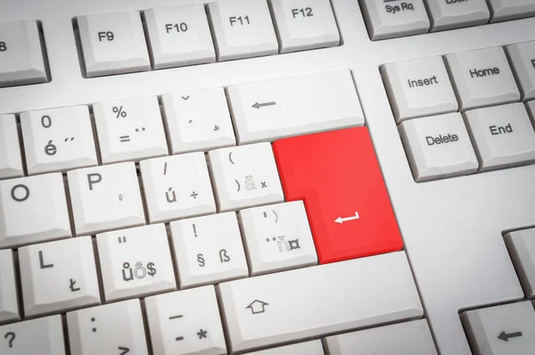 Top view of white keyboard with red Enter button — Stock Photo, Image