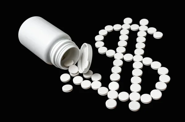 Stapel pillen in vorm dollar - concept van de medische kosten — Stockfoto